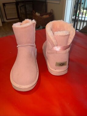 UGG Pink Short Sheepskin Boots with Back Ribbon